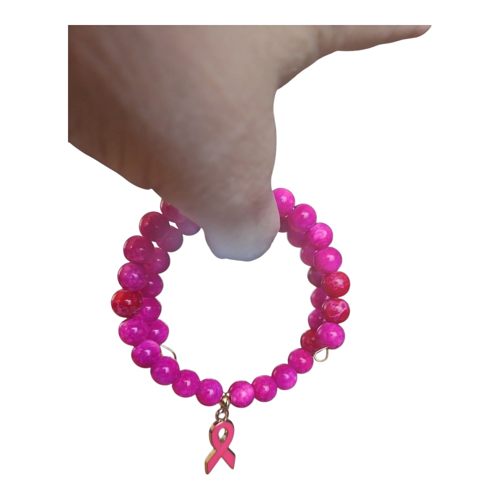 Pink Beaded Bracelet with Ribbon Charm. 2003